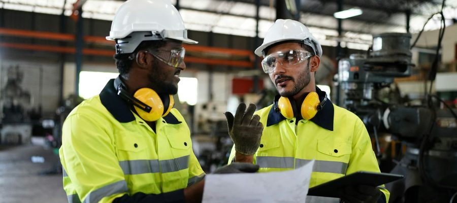 industrial factory worker working in metal manufacturing industry